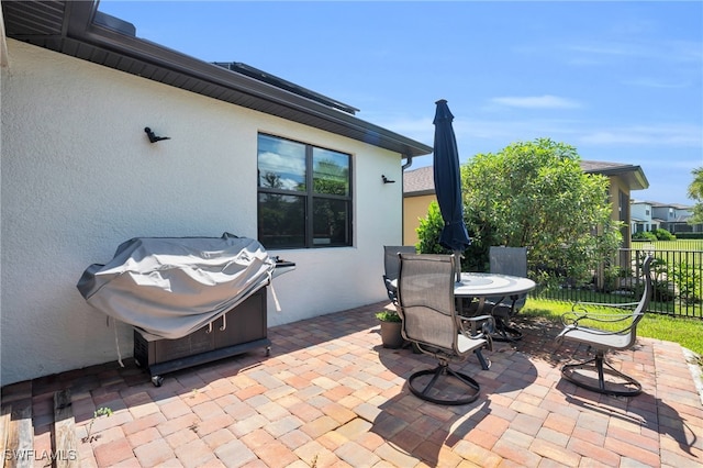 view of patio with a grill