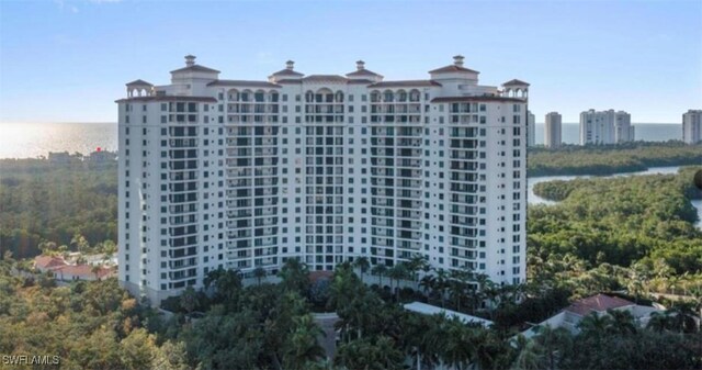 view of property with a water view