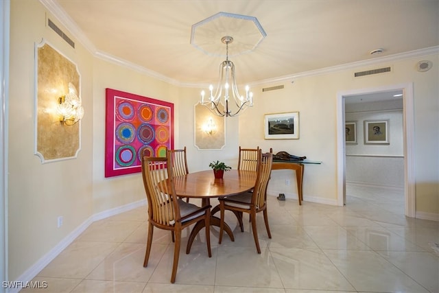 dining room featuring crown molding, light tile patterned floors, and a chandelier