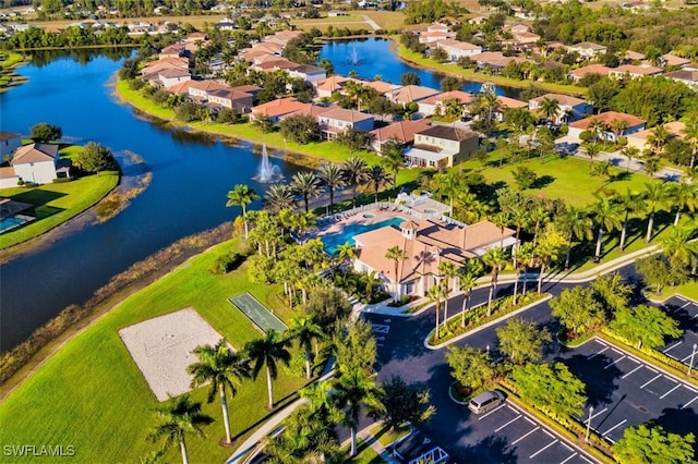 aerial view featuring a water view and a residential view