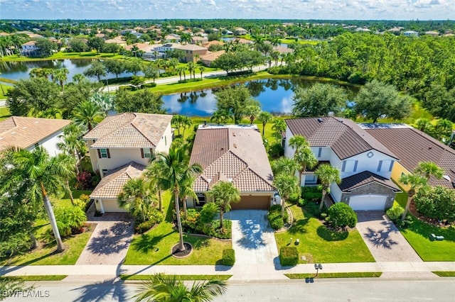 drone / aerial view featuring a water view