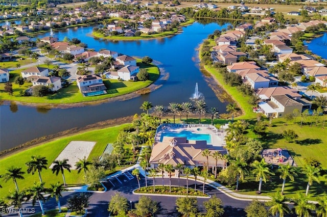 aerial view featuring a water view and a residential view