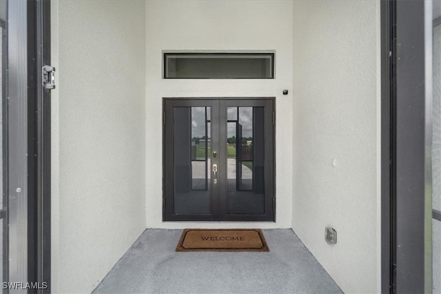 view of exterior entry with french doors