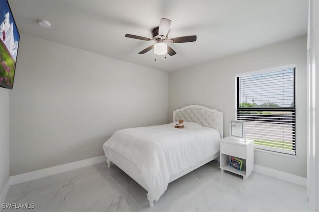 bedroom featuring ceiling fan