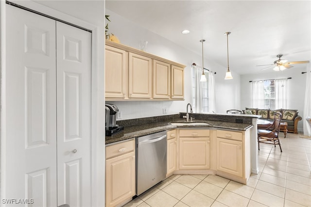 kitchen featuring sink, light tile patterned floors, stainless steel dishwasher, kitchen peninsula, and pendant lighting