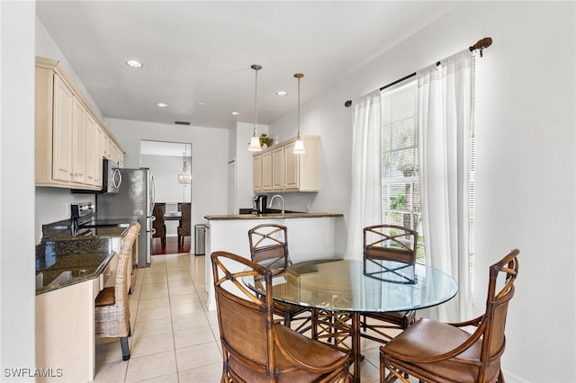 tiled dining space with sink