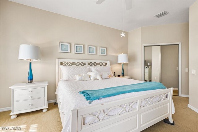 carpeted bedroom featuring ceiling fan