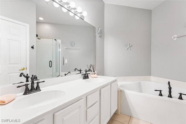 bathroom featuring vanity, plus walk in shower, and tile patterned flooring