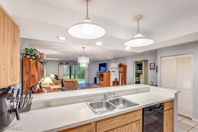 kitchen with light brown cabinets, light tile patterned floors, a chandelier, dishwasher, and sink