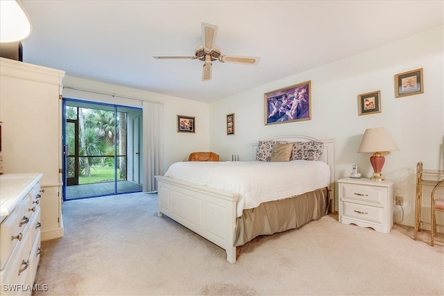 bedroom featuring light carpet, access to outside, and ceiling fan