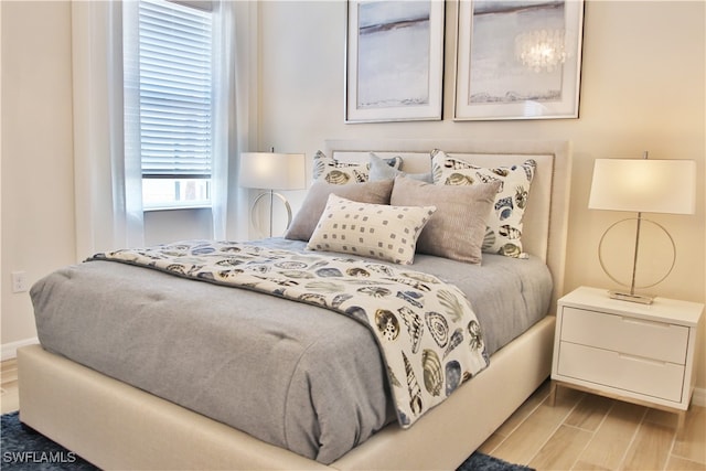 bedroom featuring light hardwood / wood-style flooring