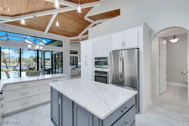 kitchen with white cabinetry, a kitchen island, an inviting chandelier, wooden ceiling, and appliances with stainless steel finishes