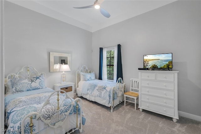 bedroom featuring ceiling fan and carpet floors