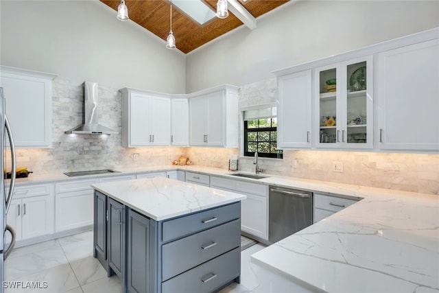 kitchen featuring white cabinetry, high vaulted ceiling, and stainless steel dishwasher