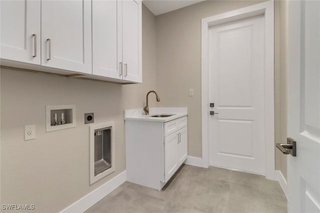 laundry area featuring cabinets, hookup for a washing machine, sink, and electric dryer hookup