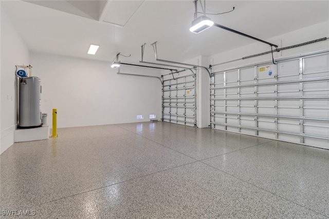 garage featuring a garage door opener and water heater