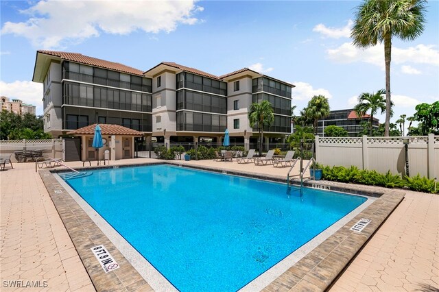 view of pool featuring a patio area