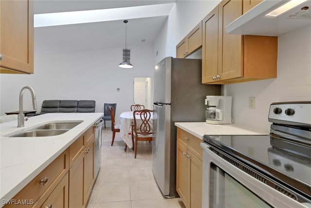 kitchen featuring pendant lighting, light tile patterned floors, sink, appliances with stainless steel finishes, and extractor fan