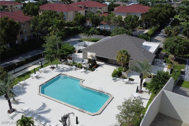 view of swimming pool with a patio area