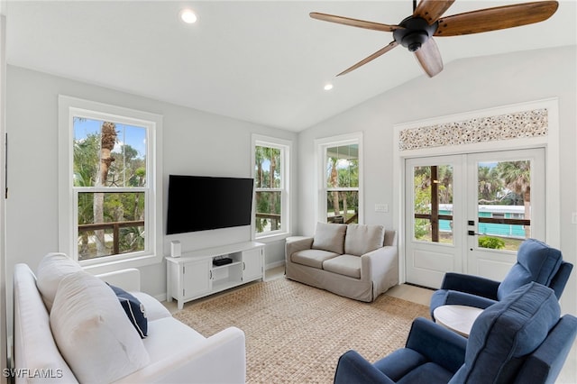 living room with french doors, a ceiling fan, lofted ceiling, and recessed lighting