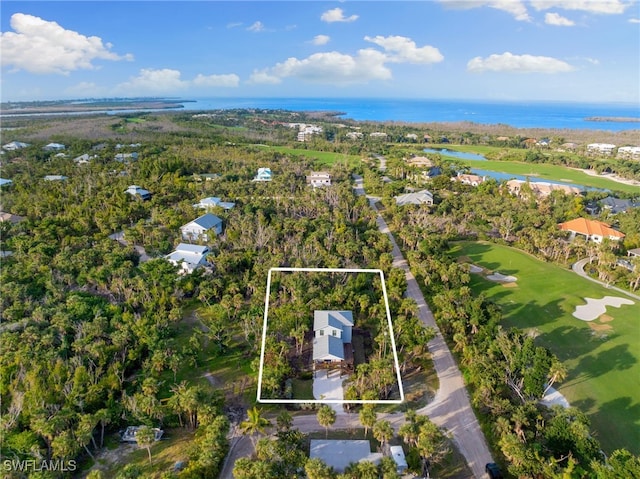 birds eye view of property featuring a water view and view of golf course