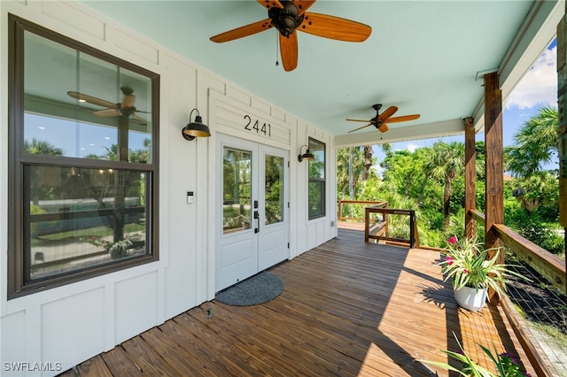 wooden deck with ceiling fan