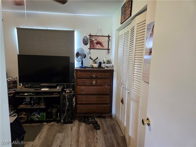 bedroom with hardwood / wood-style flooring