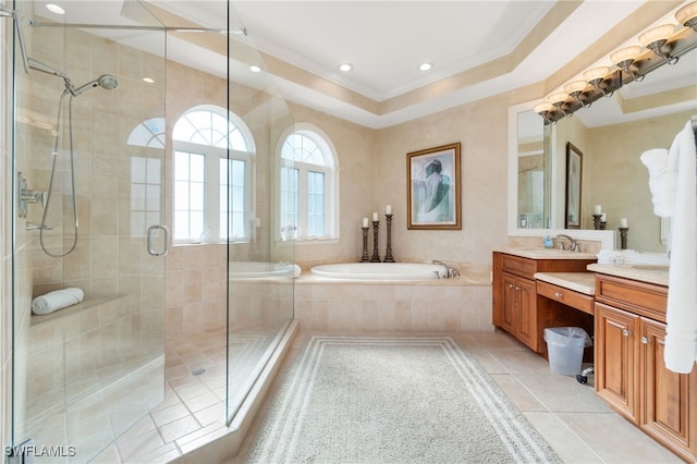 bathroom with tile patterned floors, a garden tub, vanity, a shower stall, and recessed lighting