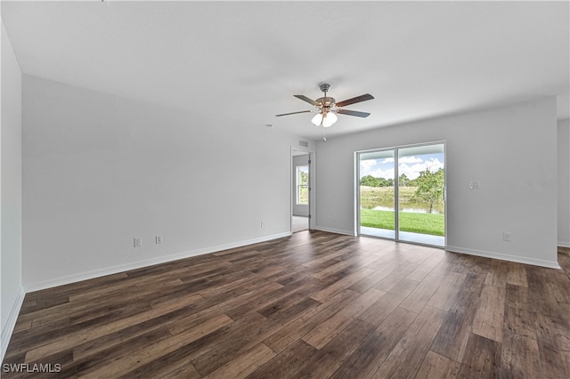 empty room featuring hardwood / wood-style flooring and ceiling fan