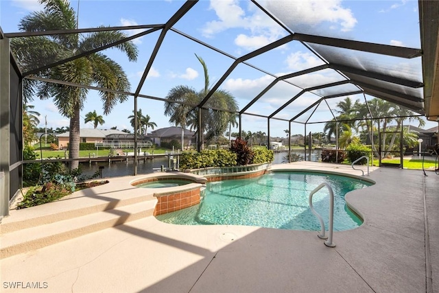 view of pool featuring a patio, a lanai, a water view, and an in ground hot tub