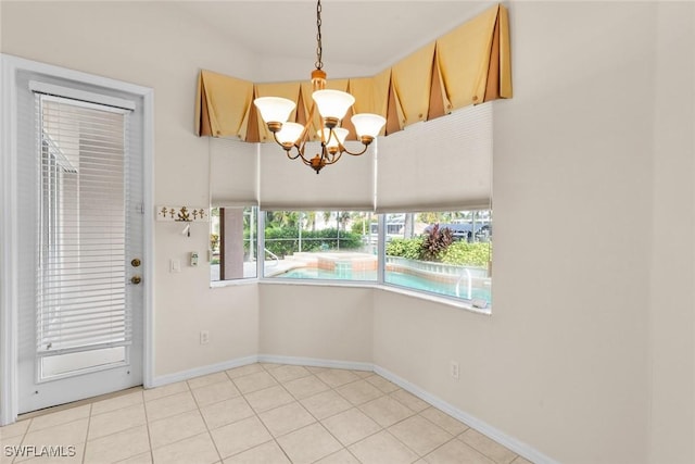 interior space featuring light tile patterned floors and a notable chandelier