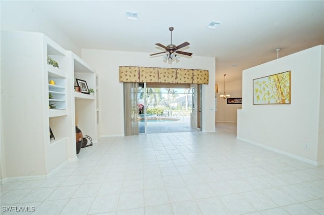 tiled empty room with ceiling fan