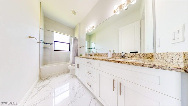 full bathroom with tile patterned flooring, vanity, toilet, and shower / bath combo