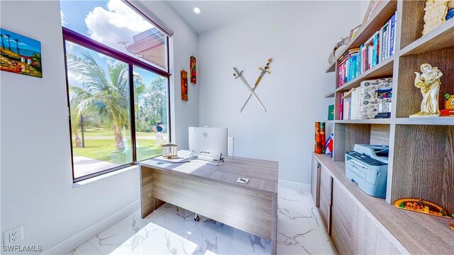 office area featuring a healthy amount of sunlight and light tile patterned flooring