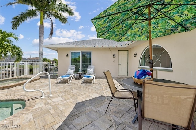 view of patio featuring a pool