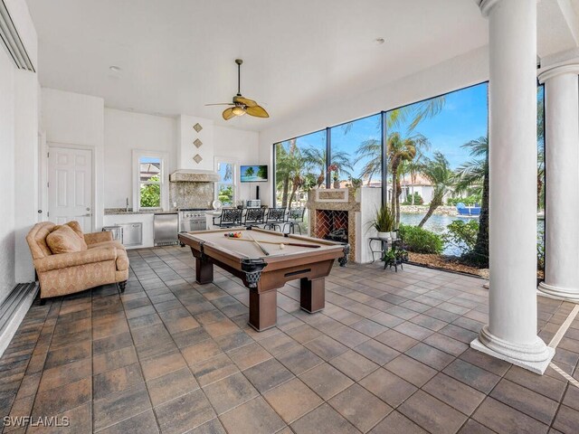 rec room featuring decorative columns, ceiling fan, and pool table