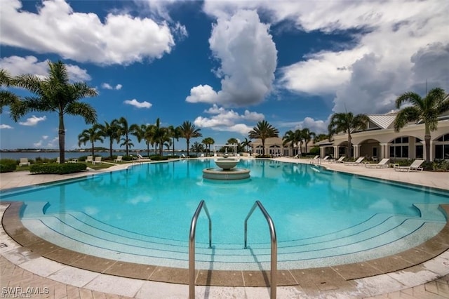 community pool featuring a patio area