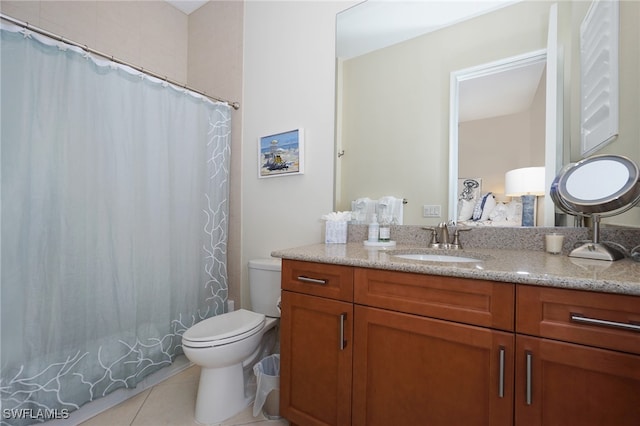 bathroom featuring vanity, tile patterned flooring, toilet, and a shower with shower curtain