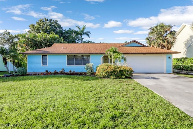 ranch-style house with a garage and a front yard