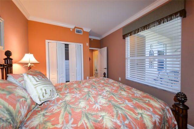 bedroom with crown molding