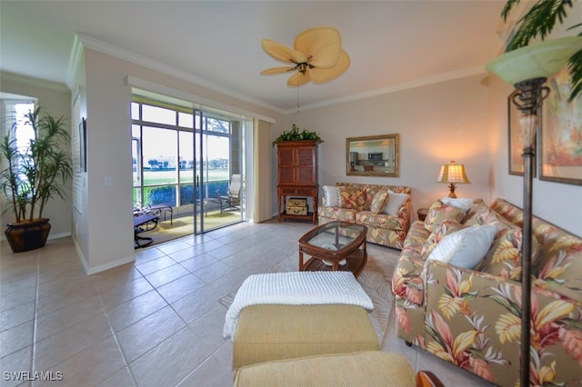 living room featuring light tile patterned floors, crown molding, and ceiling fan