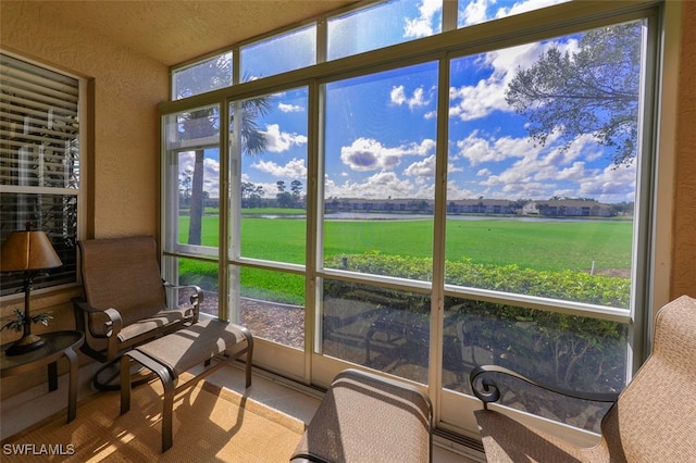 sunroom with a rural view