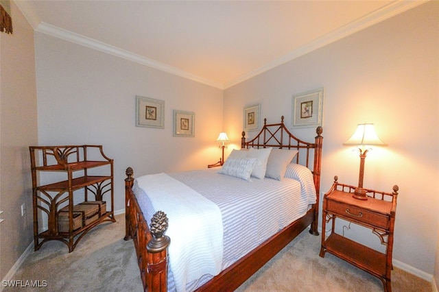 bedroom with crown molding and carpet flooring