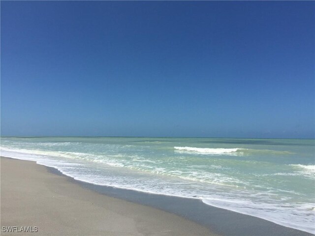 property view of water with a beach view