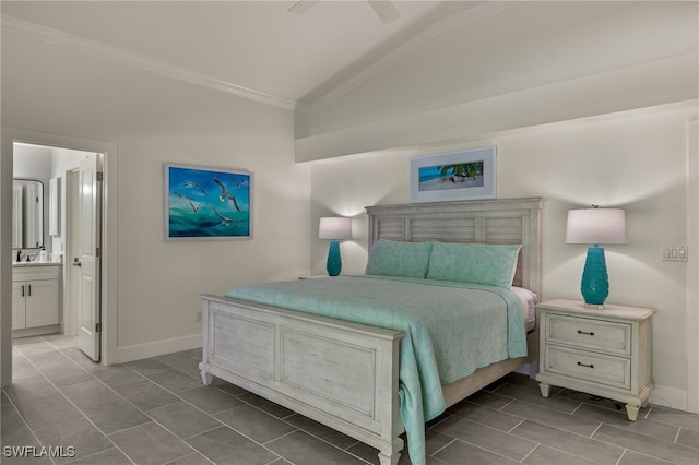 bedroom with lofted ceiling, ceiling fan, ornamental molding, and ensuite bathroom