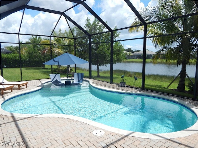 view of swimming pool featuring a water view, a lawn, a patio, and glass enclosure