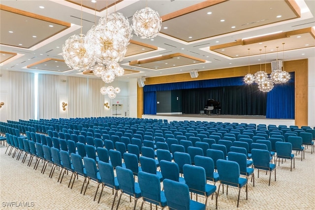 miscellaneous room featuring coffered ceiling, an inviting chandelier, and carpet flooring