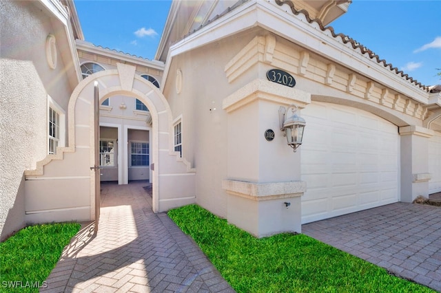 property entrance featuring a garage