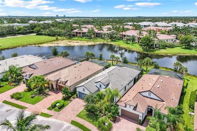 aerial view featuring a residential view and a water view