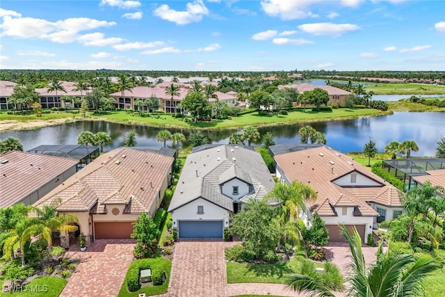 aerial view featuring a water view and a residential view